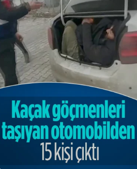 Bİr otomobilde tam 15 kişi 