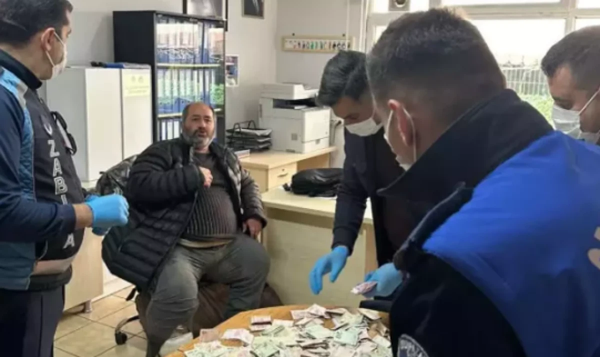 Dilencinin &uuml;zerinden &ccedil;ıkan para şaşırttı             